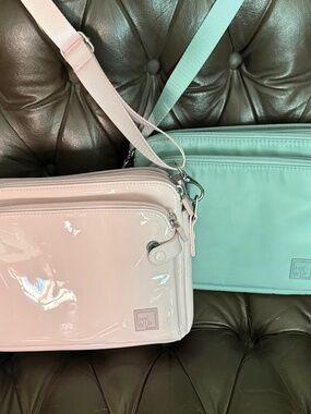Two Ihkwip cross body handbags